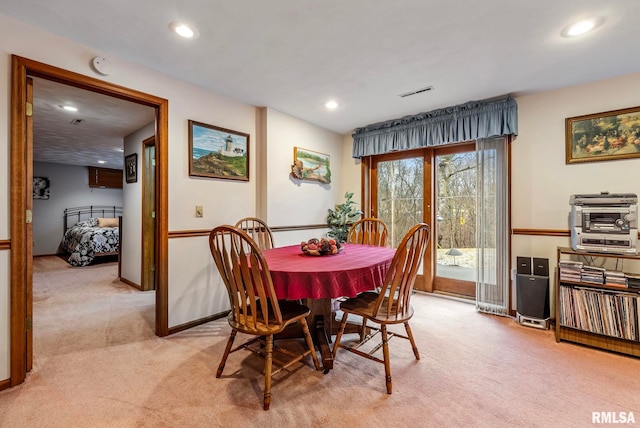 dining area with recessed lighting, baseboards, light carpet, and visible vents