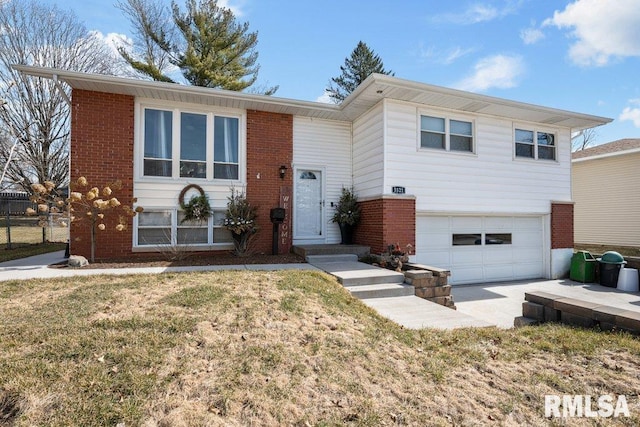 view of front facade with a garage, brick siding, and a front lawn