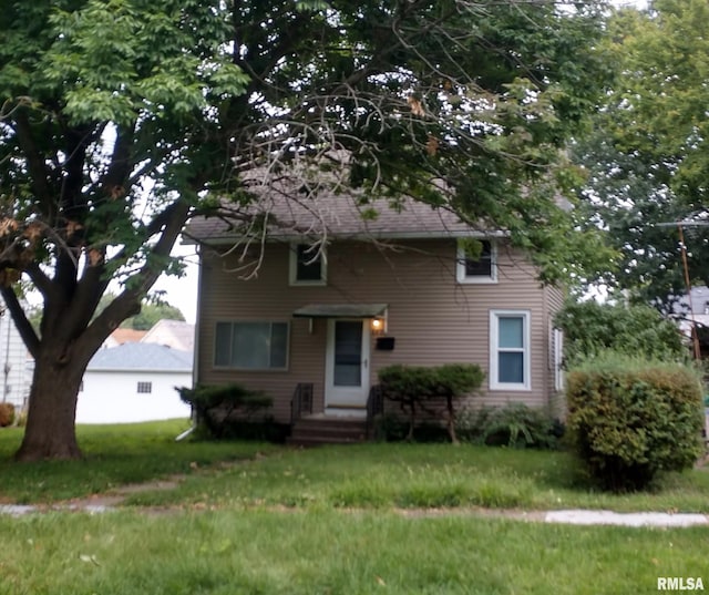 view of front of house with a front yard