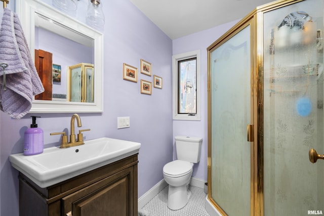 bathroom featuring vanity, baseboards, a shower stall, tile patterned floors, and toilet