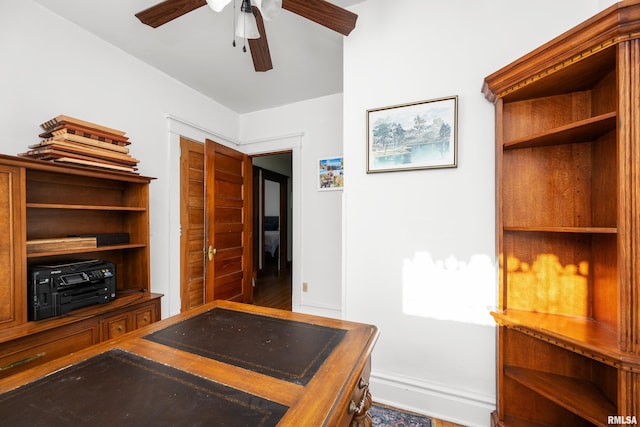 office area with ceiling fan