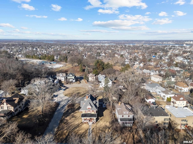 birds eye view of property with a residential view