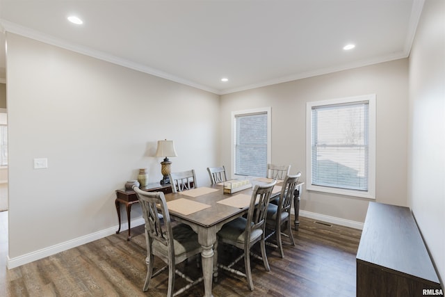 1621 S Eugene Ln, Marion, IL 62959 - dining room featuring visible vents, baseboards, wood finished floors, and ornamental molding