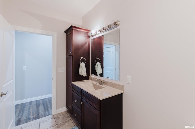 1621 S Eugene Ln, Marion, IL 62959 - bathroom with tile patterned flooring, vanity, and baseboards