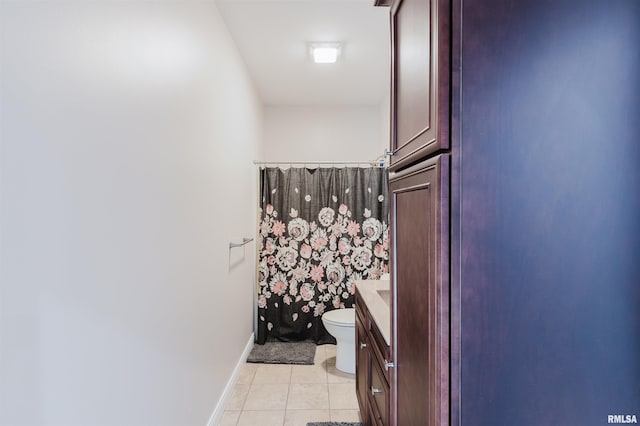 1621 S Eugene Ln, Marion, IL 62959 - full bath with vanity, baseboards, curtained shower, tile patterned floors, and toilet