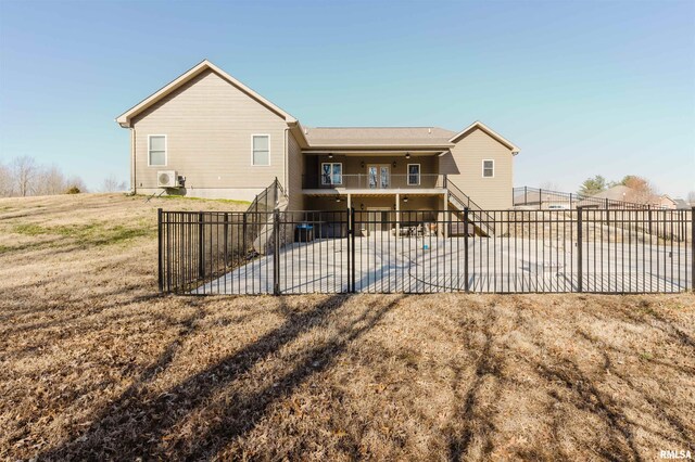 1621 S Eugene Ln, Marion, IL 62959 - back of property featuring fence, stairs, and a patio area