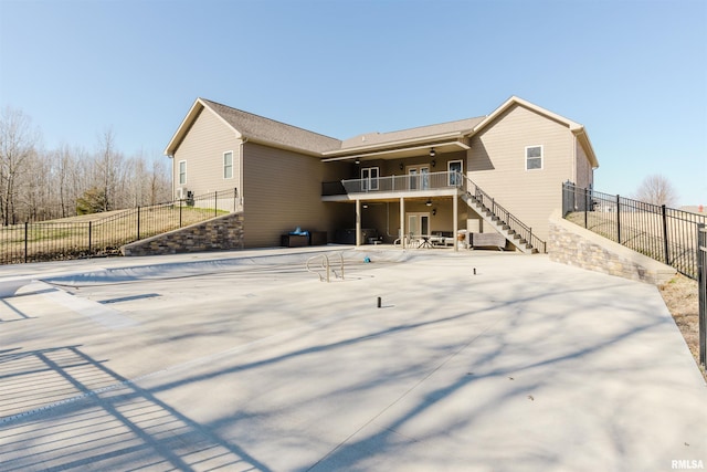 1621 S Eugene Ln, Marion, IL 62959 - back of property featuring a ceiling fan, a patio, stairway, and fence