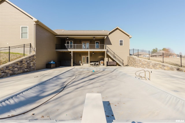 1621 S Eugene Ln, Marion, IL 62959 - rear view of house with a patio, stairway, fence, and a balcony