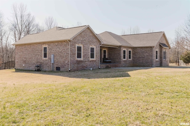 1621 S Eugene Ln, Marion, IL 62959 - rear view of property with a yard, brick siding, and roof with shingles