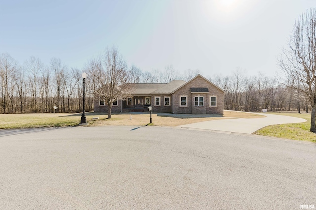 1621 S Eugene Ln, Marion, IL 62959 - view of front facade with brick siding and a front lawn