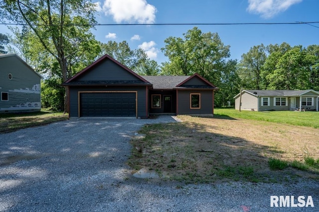 207 Rowatt St, Cambria, IL 62915 - ranch-style house featuring a garage, driveway, and a front yard