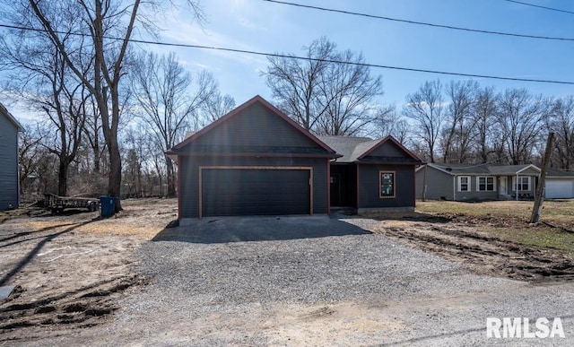 view of front facade with a garage and driveway