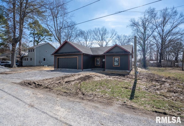 view of front facade featuring driveway and a garage