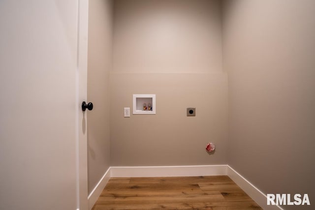 207 Rowatt St, Cambria, IL 62915 - washroom featuring hookup for an electric dryer, washer hookup, wood finished floors, and baseboards