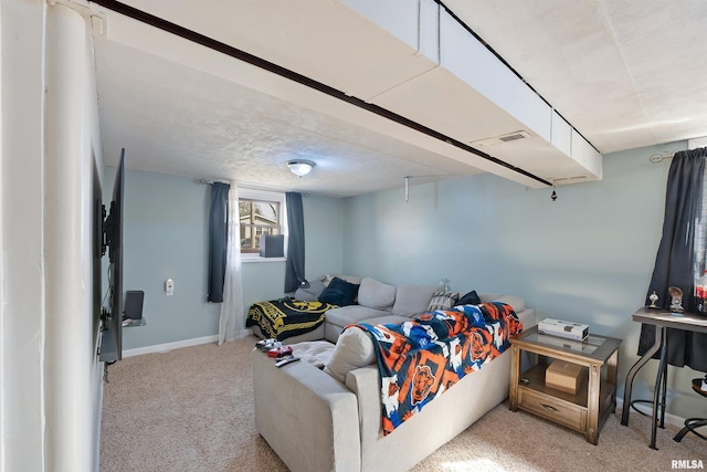 living area with baseboards and carpet floors