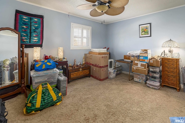 carpeted bedroom featuring a textured ceiling, crown molding, and ceiling fan