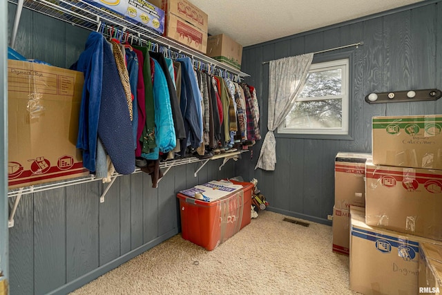 spacious closet with visible vents and carpet