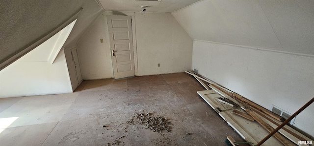 bonus room featuring lofted ceiling