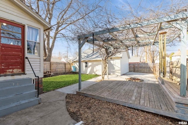 deck featuring a yard and a fenced backyard