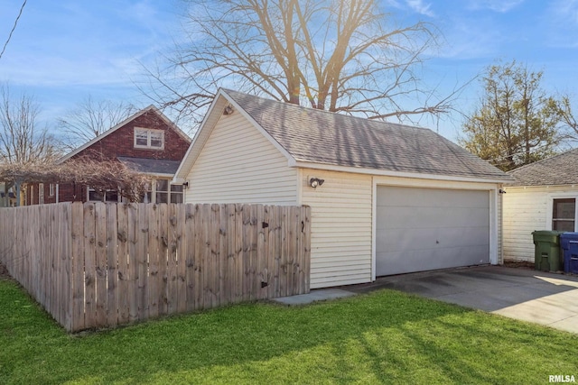 detached garage with fence