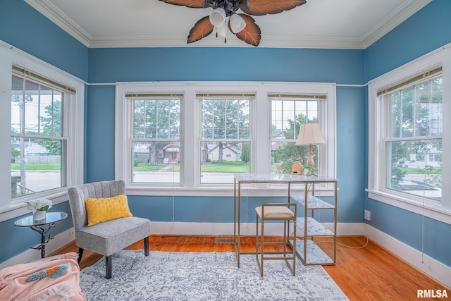 interior space featuring a healthy amount of sunlight and a ceiling fan