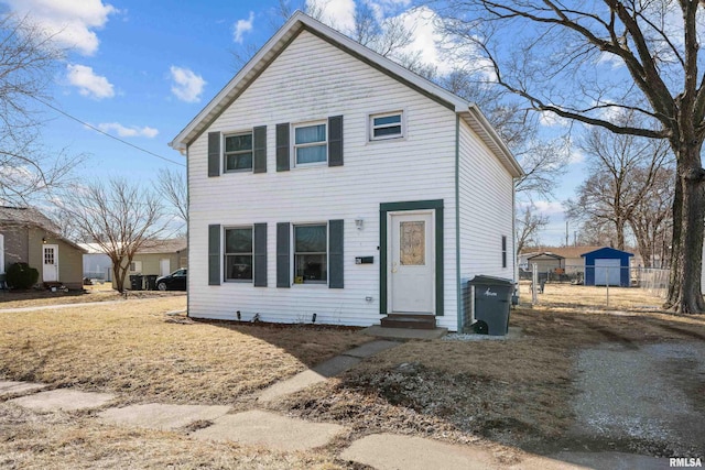 traditional-style home with entry steps