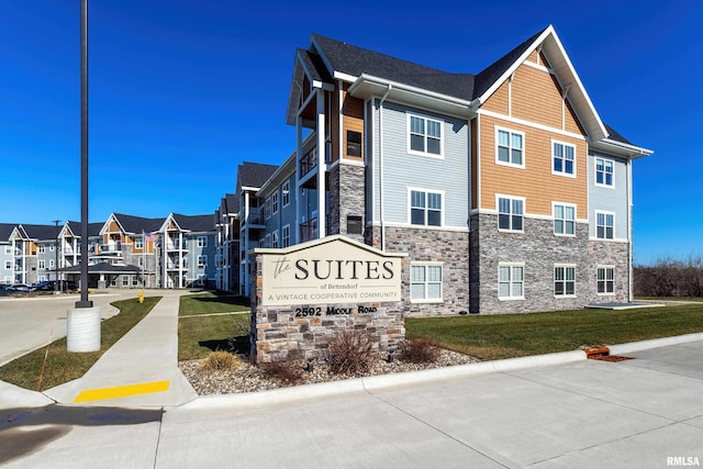 view of property with a residential view