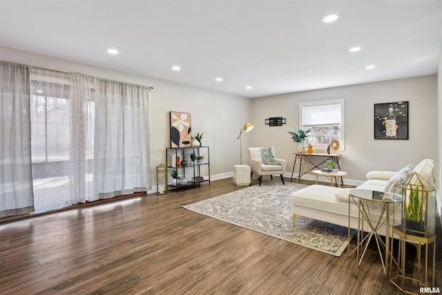 sitting room with recessed lighting, wood finished floors, and baseboards