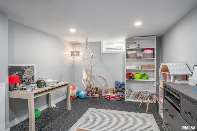 game room featuring recessed lighting and baseboards