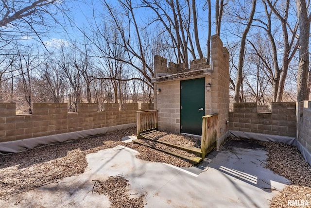 view of outdoor structure with a fenced backyard