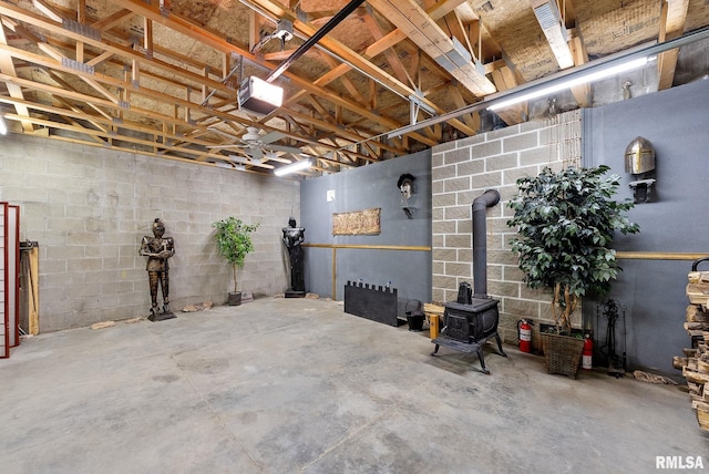 basement featuring a wood stove