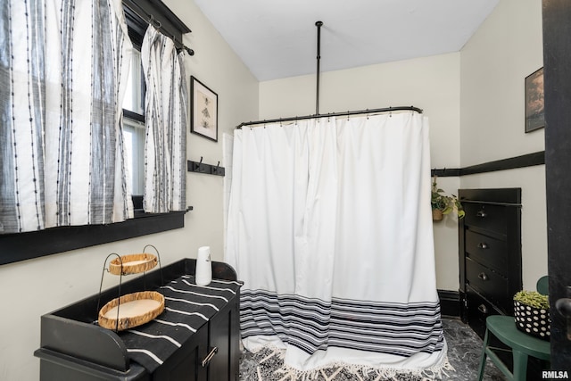 full bath featuring curtained shower and vanity