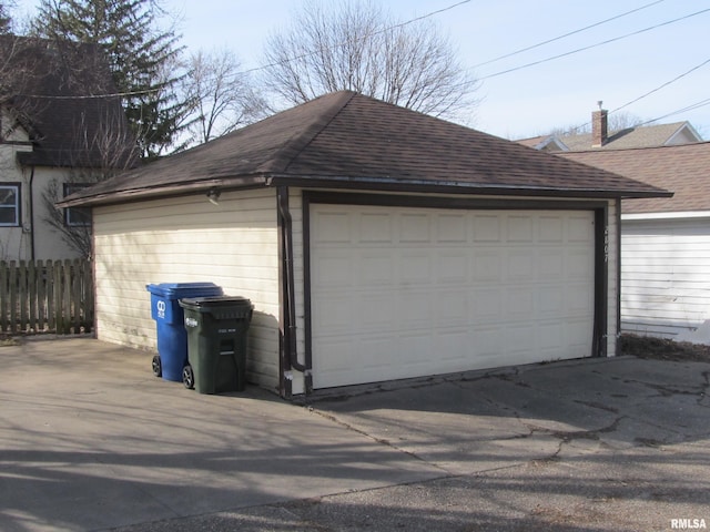 detached garage with fence