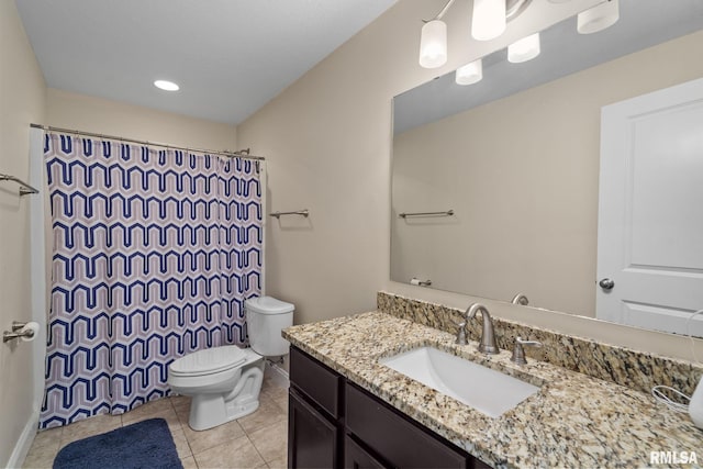 bathroom featuring vanity, baseboards, curtained shower, tile patterned floors, and toilet