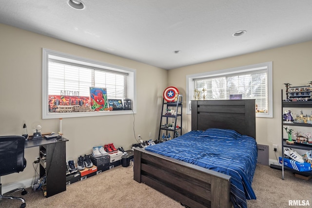 bedroom featuring carpet