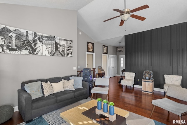 living room with high vaulted ceiling, wood finished floors, baseboards, and ceiling fan