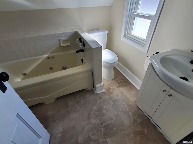 1523 W 13th St, Davenport, IA 52804 - full bath featuring toilet, a jetted tub, marble finish flooring, baseboards, and vanity