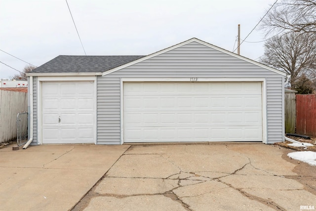 detached garage with fence