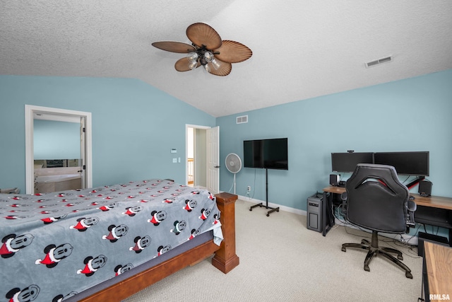 carpeted bedroom featuring visible vents, a textured ceiling, a ceiling fan, and vaulted ceiling