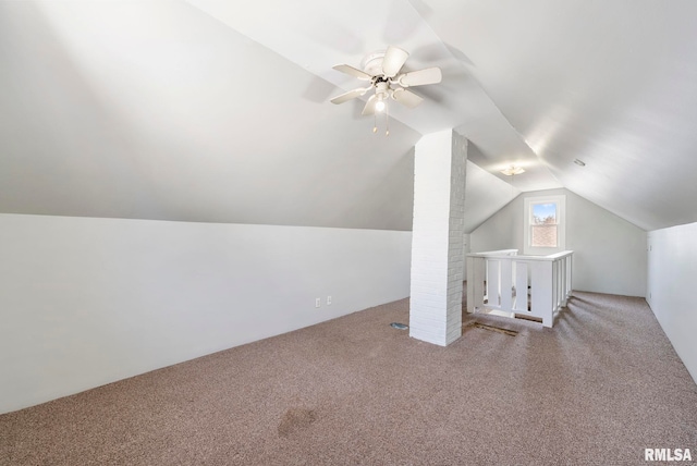 bonus room featuring a ceiling fan, lofted ceiling, and carpet floors