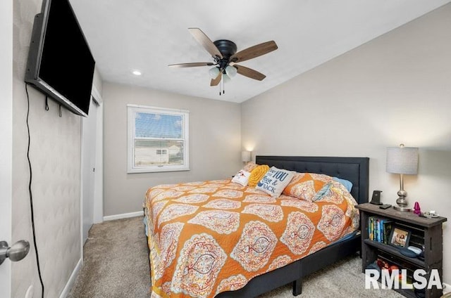 bedroom with baseboards, ceiling fan, and carpet flooring