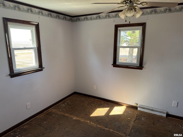 unfurnished room with ornamental molding, a ceiling fan, visible vents, and baseboards