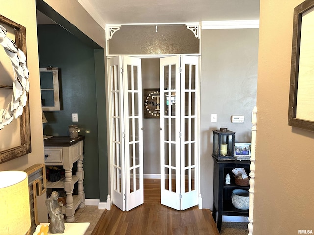 interior space with french doors and wood finished floors