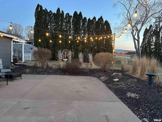 view of patio featuring fence