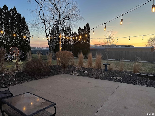 patio terrace at dusk with fence