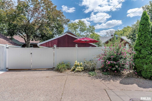 exterior space with fence and a gate