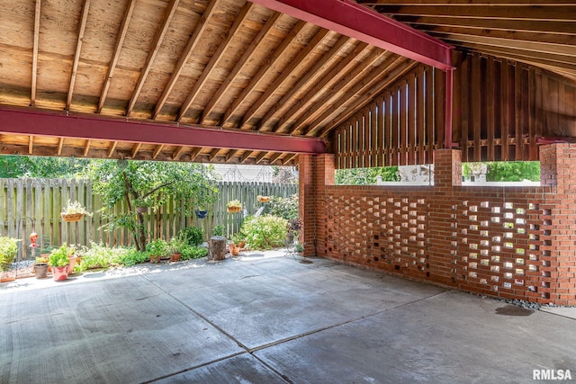 view of patio featuring fence