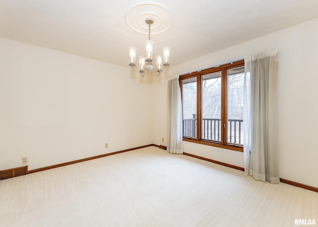 9721 234th St N, Port Byron, IL 61275 - spare room featuring a chandelier, light carpet, and baseboards