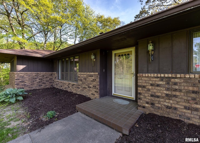 9721 234th St N, Port Byron, IL 61275 - entrance to property with brick siding and board and batten siding
