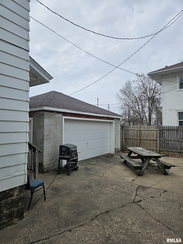 garage featuring fence